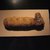  <em>Dog Mummy</em>, 510-230 B.C.E. Animal remains, linen, 17 × 5 7/8 × 3 1/4 in. (43.2 × 14.9 × 8.3 cm). Brooklyn Museum, Charles Edwin Wilbour Fund, 37.1984E. Creative Commons-BY (Photo: Brooklyn Museum, CUR.37.1984E_tlf.jpg)