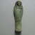  <em>Ushabti of Yuf-o</em>, 664-343 B.C.E. Faience, 3 9/16 x 1 1/16 x 11/16 in. (9 x 2.8 x 1.8 cm). Brooklyn Museum, Charles Edwin Wilbour Fund, 37.229E. Creative Commons-BY (Photo: Brooklyn Museum, CUR.37.229E_view2.jpg)
