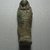  <em>Ushabti of Yuf-o</em>, 664-343 B.C.E. Faience, 3 1/4 x 7/8 x 1/2 in. (8.3 x 2.3 x 1.3 cm). Brooklyn Museum, Charles Edwin Wilbour Fund, 37.233E. Creative Commons-BY (Photo: Brooklyn Museum, CUR.37.233E_view9.jpg)