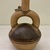Chimú. <em>Bottle</em>. Ceramic, pigment, 6 1/2 × 4 × 3 3/4 in. (16.5 × 10.2 × 9.5 cm). Brooklyn Museum, Frank Sherman Benson Fund and the Henry L. Batterman Fund, 37.2638PA. Creative Commons-BY (Photo: Brooklyn Museum, CUR.37.2638PA_view01.jpg)