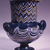  <em>Vase with Three Handles</em>, ca. 1352-1336 B.C.E. Glass, 3 1/2 × Diam. 3 in. (8.9 × 7.6 cm). Brooklyn Museum, Charles Edwin Wilbour Fund, 37.340E. Creative Commons-BY (Photo: Brooklyn Museum, CUR.37.340E_view1.jpg)