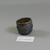 Islamic. <em>Small Cup</em>, 7th-11th century C.E. Glass, 1 x Diam. 1 5/16 in. (2.5 x 3.3 cm). Brooklyn Museum, Charles Edwin Wilbour Fund, 37.350E. Creative Commons-BY (Photo: Brooklyn Museum, CUR.37.350E_view1.jpg)