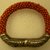  <em>Bracelet</em>, 19th century. Wood, coral beads, silver, metal wire, 2 15/16 x 3 7/16 x 9/16 in. (7.4 x 8.7 x 1.5 cm). Brooklyn Museum, Frank L. Babbott Fund, 37.371.176. Creative Commons-BY (Photo: Brooklyn Museum, CUR.37.371.176.jpg)