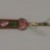  <em>Hair Pin</em>, early 20th century. Gilt silver, kingfisher feather, pink tourmaline, jade, coral, garnet, 7 15/16 x 13/16 in. (20.2 x 2 cm). Brooklyn Museum, Frank L. Babbott Fund, 37.371.251. Creative Commons-BY (Photo: Brooklyn Museum, CUR.37.371.251_back.jpg)