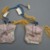  <em>Pair of Pouches</em>, early 20th century. Satin, 3 3/8 x 3 1/8 in. (8.5 x 8 cm). Brooklyn Museum, Frank L. Babbott Fund, 37.371.312a-b. Creative Commons-BY (Photo: Brooklyn Museum, CUR.37.371.312a-b_side1.jpg)