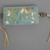 <em>Card Case and Cover</em>. Cardboard, embroidered silk, cords, 2 3/4 x 7/8 x 5 1/8 in. (7 x 2.2 x 13 cm). Brooklyn Museum, Frank L. Babbott Fund, 37.371.46. Creative Commons-BY (Photo: Brooklyn Museum, CUR.37.371.46_back.jpg)