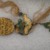 <em>Tassel</em>. Silk, wood, with fringe: 2 3/8 x 13 3/8 in. (6 x 34 cm). Brooklyn Museum, Frank L. Babbott Fund, 37.371.85. Creative Commons-BY (Photo: Brooklyn Museum, CUR.37.371.85_detail1.jpg)
