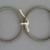  <em>Two Bracelets</em>. Silver bands, each: 1/2 x 2 3/8 x 2 13/16 in. (1.2 x 6 x 7.2 cm). Brooklyn Museum, Frank L. Babbott Fund, 37.371.9. Creative Commons-BY (Photo: Brooklyn Museum, CUR.37.371.9_top.jpg)