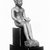  <em>Small Statue of Imhotep</em>, 305-30 B.C.E. Bronze, 3 7/8 x 1 1/8 x 1 7/8 in. (9.8 x 2.9 x 4.8 cm). Brooklyn Museum, Charles Edwin Wilbour Fund, 37.374E. Creative Commons-BY (Photo: Brooklyn Museum, CUR.37.374E_threequarter_negA_bw.jpg)