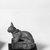  <em>Weight in Form of a Cat</em>, ca. 1550-30 B.C.E. Bronze, silver, lead, 2 1/4 x 1 1/8 x 2 3/8 in., 0.6 lb. (5.7 x 2.9 x 6 cm, 257.52 g). Brooklyn Museum, Charles Edwin Wilbour Fund, 37.424E. Creative Commons-BY (Photo: Brooklyn Museum, CUR.37.424E_neg_37.406E_grpB_bw.jpg)