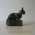  <em>Weight in Form of a Cat</em>, ca. 1550-30 B.C.E. Bronze, silver, lead, 2 1/4 x 1 1/8 x 2 3/8 in., 0.6 lb. (5.7 x 2.9 x 6 cm, 257.52 g). Brooklyn Museum, Charles Edwin Wilbour Fund, 37.424E. Creative Commons-BY (Photo: Brooklyn Museum, CUR.37.424E_view4.jpg)