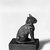  <em>Figurine of a Cat</em>, 664 B.C.E. or later. Bronze, Height (without tang) 2 7/16 x 7/8 x 1 5/8 in. (6.2 x 2.2 x 4.1 cm). Brooklyn Museum, Charles Edwin Wilbour Fund, 37.425E. Creative Commons-BY (Photo: Brooklyn Museum, CUR.37.425E_neg_37.406E_grpB_bw.jpg)