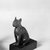  <em>Statue of a Cat</em>, 305-30 B.C.E. Bronze, with tang: 4 13/16 x 1 13/16 x 2 7/8 in. (12.3 x 4.6 x 7.3 cm). Brooklyn Museum, Charles Edwin Wilbour Fund, 37.426E. Creative Commons-BY (Photo: Brooklyn Museum, CUR.37.426E_neg_37.406E_grpA_bw.jpg)