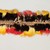 Shuar or. <em>Headband</em>, early 20th century. Cotton, feathers, 4 3/4 × 1 3/4 × 27 3/16 in. (12.1 × 4.4 × 69.1 cm). Brooklyn Museum, Museum Collection Fund, 37.477. Creative Commons-BY (Photo: Brooklyn Museum, CUR.37.477_view01.jpg)
