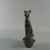  <em>Top of Ceremonial Staff in the Form of the Papyrus Umbel Surmounted by a Cat</em>, ca. 1539-1075 B.C.E. or later. Bronze, 4 3/16 x 5 1/8 in. (10.6 x 13 cm). Brooklyn Museum, Charles Edwin Wilbour Fund, 37.574E. Creative Commons-BY (Photo: Brooklyn Museum, CUR.37.574E_View1.jpg)