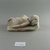  <em>Small Figure of a Woman Lying on a Couch</em>, 305-30 B.C.E. Limestone, pigment, 1 13/16 x 1 9/16 x 3 5/8 in. (4.6 x 3.9 x 9.2 cm). Brooklyn Museum, Charles Edwin Wilbour Fund, 37.590E. Creative Commons-BY (Photo: Brooklyn Museum, CUR.37.590E_view3.jpg)