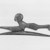 Egyptian. <em>Hair Curler in the Form of  a Woman</em>, ca. 1539-1292 B.C.E. Bronze, 7/8 x 2 5/16 in. (2.2 x 5.9 cm). Brooklyn Museum, Charles Edwin Wilbour Fund, 37.654E. Creative Commons-BY (Photo: Brooklyn Museum, CUR.37.654E_print_negB_bw.jpg)