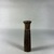  <em>Kohl Jar in the Form of a Lotus Column, Cover Missing</em>, ca. 1539–1075 B.C.E. Wood, powder, metal, 3 1/8 × Diam. 13/16 in. (7.9 × 2.1 cm). Brooklyn Museum, Charles Edwin Wilbour Fund, 37.669E. Creative Commons-BY (Photo: Brooklyn Museum, CUR.37.669E_overall01.JPG)