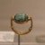  <em>Scarab of Thutmose III Mounted in Ring</em>, ca. 1479-1425 B.C.E. Steatite, glaze, gold, 1 1/16 × 15/16 in. (2.7 × 2.4 cm). Brooklyn Museum, Charles Edwin Wilbour Fund, 37.720E. Creative Commons-BY (Photo: Brooklyn Museum, CUR.37.720E_erg456.jpg)
