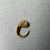  <em>Small Loop Earring with Lion's Head</em>, late 4th-3rd century B.C.E. Gold, Diameter: 11/16 in. (1.7 cm). Brooklyn Museum, Charles Edwin Wilbour Fund, 37.777E. Creative Commons-BY (Photo: Brooklyn Museum, CUR.37.777E_overall02.JPG)