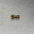  <em>Djed Pillar</em>, ca. 945-712 B.C.E. Gold, bitumen, 11/16 × 1/4 × 1/16 in. (1.7 × 0.7 cm, 2mm). Brooklyn Museum, Charles Edwin Wilbour Fund, 37.806E. Creative Commons-BY (Photo: Brooklyn Museum, CUR.37.806E_back.JPG)
