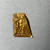  <em>Plaque with Figures of Isis Seated Holding the Child Horus</em>, 305–30 B.C.E. Gold, 1 9/16 × 7/8 × 1/16 in. (3.9 × 2.2 cm, 2.2mm). Brooklyn Museum, Charles Edwin Wilbour Fund, 37.813E. Creative Commons-BY (Photo: Brooklyn Museum, CUR.37.813E_back.JPG)