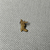 Egyptian. <em>Amulet Representing Anubis (?) Kneeling</em>. Gold, 7/16 × 1/4 in. (1.1 × 0.6 cm). Brooklyn Museum, Charles Edwin Wilbour Fund, 37.816E. Creative Commons-BY (Photo: Brooklyn Museum, CUR.37.816E_overall.JPG)