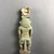  <em>Bes Amulet</em>, 664-332 B.C.E. Faience, 3 5/8 × 1 1/8 × 11/16 in. (9.2 × 2.9 × 1.8 cm). Brooklyn Museum, Charles Edwin Wilbour Fund, 37.925E. Creative Commons-BY (Photo: , CUR.37.925E_view02.jpg)