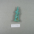  <em>Figure of Pataikos</em>, 664–525 B.C.E. Faience, 2 7/16 x 13/16 x 1 1/16 in. (6.2 x 2 x 2.7 cm). Brooklyn Museum, Charles Edwin Wilbour Fund, 37.998E. Creative Commons-BY (Photo: Brooklyn Museum, CUR.37.998E_leftprofile.jpg)