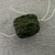  <em>Carved Jade Bead</em>. Jadeite, 15/16 x 1/2 x 1 in. (2.4 x 1.3 x 2.5 cm). Brooklyn Museum, Carll H. de Silver Fund, 38.57. Creative Commons-BY (Photo: Brooklyn Museum, CUR.38.57_overall.jpg)