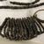 Samoan. <em>Necklace</em>. Coconut shell, fiber, clay, 14 15/16 x 4 3/4 in. (38 x 12 cm). Brooklyn Museum, Dick S. Ramsay Fund, 38.637. Creative Commons-BY (Photo: , CUR.38.637_detail01.jpg)
