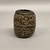 Maya. <em>Barrel-Shaped Stamp</em>. Reddish clay, 1 1/2 × 1 1/2 × 1 7/8 in. (3.8 × 3.8 × 4.8 cm). Brooklyn Museum, Ella C. Woodward Memorial Fund, 39.123.9. Creative Commons-BY (Photo: Brooklyn Museum, CUR.39.123.9_overall02.jpg)