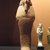 Nubian. <em>Shabty of Taharqa</em>, ca. 690-664 B.C.E. Ankerite, 15 1/2 x 5 1/4 x 3 1/4 in. (39.4 x 13.3 x 8.3 cm). Brooklyn Museum, By exchange, 39.3. Creative Commons-BY (Photo: Brooklyn Museum, CUR.39.3_mummychamber.jpg)