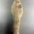 Nubian. <em>Ushabti of King Taharqa</em>, ca. 1075–656 B.C.E. Egyptian alabaster (calcite), 13 1/8 x 4 3/16 x depth at base 2 7/16 in. (33.3 x 10.7 x 6.2 cm). Brooklyn Museum, By exchange, 39.4. Creative Commons-BY (Photo: Brooklyn Museum, CUR.39.4_back.JPG)