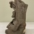 Zapotec. <em>Funerary Urn in Form of Seated Figure</em>, ca. 200-700. Gray clay, 10 1/2 × 8 1/4 × 6 1/2 in. (26.7 × 21 × 16.5 cm). Brooklyn Museum, Ella C. Woodward Memorial Fund, 40.713. Creative Commons-BY (Photo: Brooklyn Museum, CUR.40.713_side02.jpg)