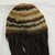 Coastal Wari. <em>Wig Headdress</em>, 600-1000. Cotton, camelid fiber, human hair, bast fiber, 35 13/16 x 8 3/4 x 2 1/2 in. (91 x 22.2 x 6.4 cm). Brooklyn Museum, Henry L. Batterman Fund, 41.427. Creative Commons-BY (Photo: Brooklyn Museum, CUR.41.427_view3.jpg)