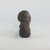 Marquesan. <em>Figure (Tiki Ke'a)</em>, before 1938. Stone, 5 1/4 x 2 3/4 x 2 3/8 in. (13.3 x 7 x 6 cm). Brooklyn Museum, A. Augustus Healy Fund, 42.211.83. Creative Commons-BY (Photo: Brooklyn Museum, CUR.42.211.83_side_PS5.jpg)