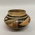 Hopi Pueblo. <em>Jar</em>. Ceramic, pigment, 3 1/16 × 4 1/8 × 4 3/16 in. (7.8 × 10.5 × 10.6 cm). Brooklyn Museum, Anonymous gift in memory of Dr. Harlow Brooks, 43.201.194. Creative Commons-BY (Photo: Brooklyn Museum, CUR.43.201.194_view02.jpg)