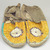Sioux. <em>Pair of Moccasins</em>, ca. 1882. Hide, porcupine twill, 10 7/16 x 3 15/16 in. (26.5 x 10 cm). Brooklyn Museum, Anonymous gift in memory of Dr. Harlow Brooks, 43.201.66a-b. Creative Commons-BY (Photo: Brooklyn Museum, CUR.43.201.66a-b.jpg)