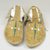 Arapaho Northern. <em>Pair of Moccasins</em>, early 20th century. Hide, beads, 10 5/8 x 3 15/16 in. (27 x 10 cm). Brooklyn Museum, Anonymous gift in memory of Dr. Harlow Brooks, 43.201.70a-b. Creative Commons-BY (Photo: Brooklyn Museum, CUR.43.201.70a-b_view3.jpg)