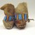 Interior Salish. <em>Pair of Child's Moccasins</em>, 1885-1895. Smoked hide, beads, cut steel beads, 7 1/2 x 3 1/8 in. (19.1 x 7.9 cm). Brooklyn Museum, Anonymous gift in memory of Dr. Harlow Brooks, 43.201.72a-b. Creative Commons-BY (Photo: Brooklyn Museum, CUR.43.201.72a-b_view3.jpg)