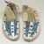 Probably Sioux. <em>Pair of Boy's Moccasins</em>, early 20th century. Rawhide, beads, 7 1/2 x 2 3/4 in. (19.1 x 7 cm). Brooklyn Museum, Anonymous gift in memory of Dr. Harlow Brooks, 43.201.76a-b. Creative Commons-BY (Photo: Brooklyn Museum, CUR.43.201.76a-b_view1.jpg)