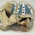 Probably Sioux. <em>Pair of Boy's Moccasins</em>, early 20th century. Rawhide, beads, 7 1/2 x 2 3/4 in. (19.1 x 7 cm). Brooklyn Museum, Anonymous gift in memory of Dr. Harlow Brooks, 43.201.76a-b. Creative Commons-BY (Photo: Brooklyn Museum, CUR.43.201.76a-b_view2.jpg)
