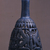  <em>Bottle with Openwork Shell</em>, ca. 1075-712 B.C.E. Egyptian blue, 6 11/16 x greatest diam. 2 15/16 in. (17 x 7.5 cm). Brooklyn Museum, Charles Edwin Wilbour Fund, 44.175. Creative Commons-BY (Photo: Brooklyn Museum, CUR.44.175_view2.jpg)