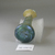 Roman. <em>Small Bottle or Vase</em>, 1st-3rd century C.E. Glass, 3 1/4 x greatest diam. 1 5/8 in. (8.3 x 4.1 cm). Brooklyn Museum, Gift of Mrs. Adrian Van Sinderen, 46.154.10. Creative Commons-BY (Photo: Brooklyn Museum, CUR.46.154.10_bottom.jpg)