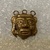  <em>Aztec Head</em>, 1440-1521. Gold, 3/4 × 3/4 × 5/16 in. (1.9 × 1.9 × 0.8 cm). Brooklyn Museum, Carll H. de Silver Fund, 46.76. Creative Commons-BY (Photo: Brooklyn Museum, CUR.46.76_view01.jpg)