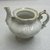 Tucker and Hemphill. <em>Miniature Teaset</em>, 1831-1837. Porcelain, Teapot: 3 in. (7.6 cm). Brooklyn Museum, Gift of Arthur W. Clement, 48.1.1a-h. Creative Commons-BY (Photo: Brooklyn Museum, CUR.48.1.1a_side1.jpg)