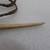 Fijian. <em>Sail Needle (Saulaca)</em>, late 19th century. Bone, fiber, pigment, 9 1/4 x 1/2 in. (23.5 x 1.3 cm). Brooklyn Museum, Gift of Mrs. James C. Pryor, 48.31.24. Creative Commons-BY (Photo: , CUR.48.31.24_detail02.jpg)
