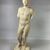 Classical; Alexandrian?. <em>Nude Young Man Standing on Circular Base</em>, 2nd century B.C.E. and later, or 19th century C.E. Marble, 13 3/4 × 5 5/16 × 4 5/16 in. (35 × 13.5 × 11 cm). Brooklyn Museum, Gift of Albert Gallatin, 50.61. Creative Commons-BY (Photo: Brooklyn Museum, CUR.50.61_view01.jpg)