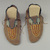Sioux. <em>Pair of Moccasins</em>, early 19th century. Hide, beads, bird quills, porcupine quills, tin, deer hair, sinew, pigment, 4 x 5 x 11 in. (10.2 x 12.7 x 27.9 cm). Brooklyn Museum, Henry L. Batterman Fund and Frank Sherman Benson Fund, 50.67.23a-b. Creative Commons-BY (Photo: Brooklyn Museum, CUR.50.67.23a-b.jpg)